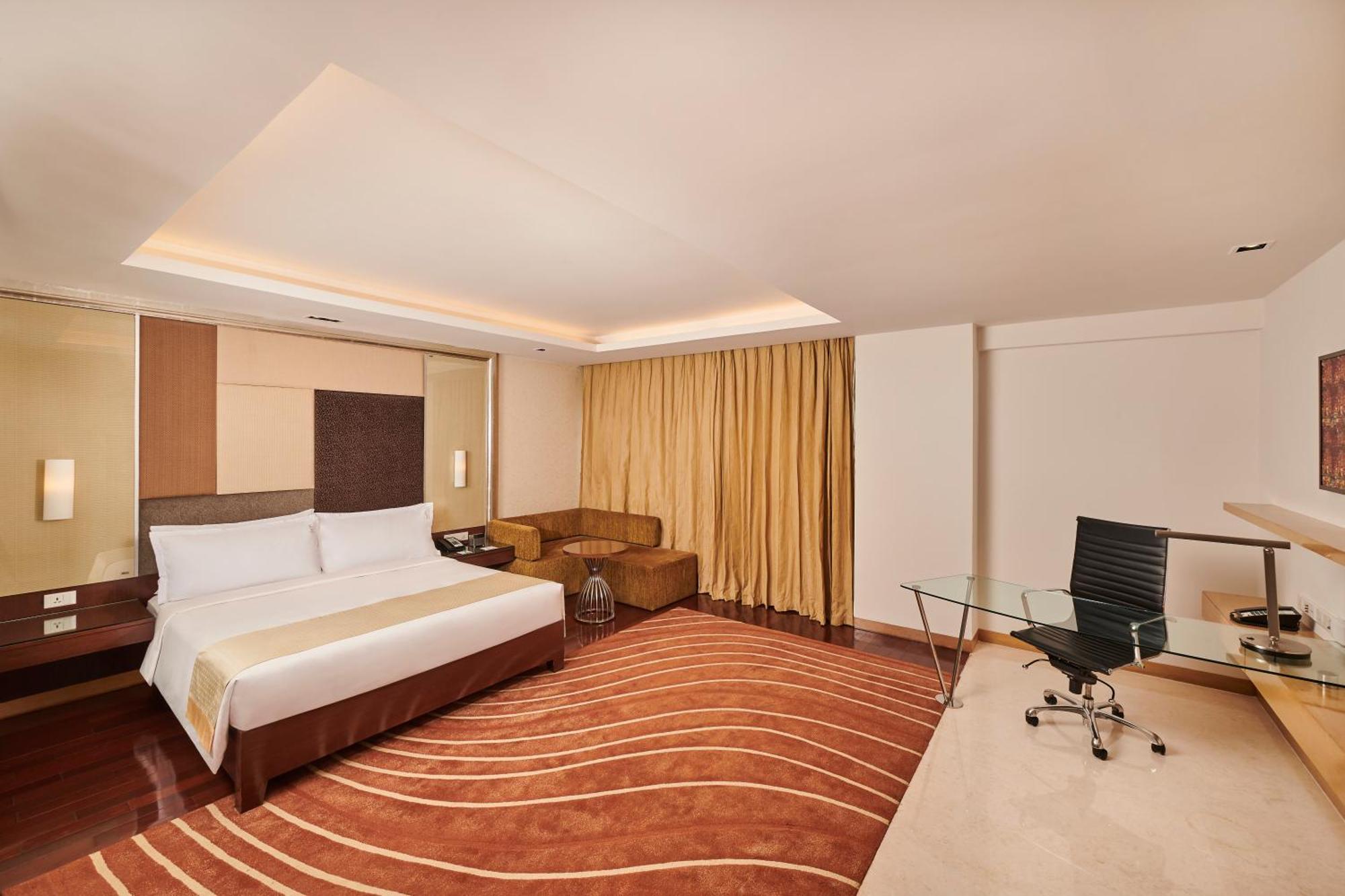 King Suite Lounge Access on Laundry Dining Spa Airport Transfers Happy Hour at 72 Bar buy 1 1 on select beverages from 7pm 9 PM